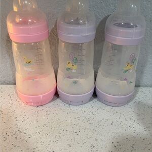 Set of 3 Baby Bottles with Pastel Pink and Lavender Accents